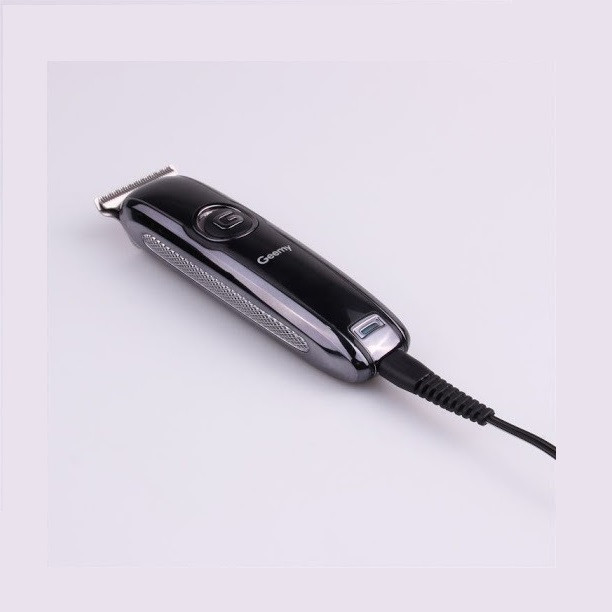 ماشین اصلاح موی سر و صورت جیمی مدل GM-6050، نمایشگر وضعیت باتری، منبع انرژی با برق، تکنولوژی اصلاح به صورت برش مستقیم، اندازه اصلاح 0.1 میلیمتر، بههمراه روغن، برس تمیزکننده