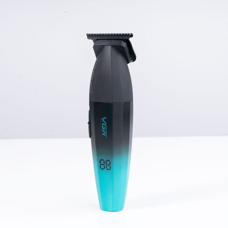 ماشین اصلاح موی سر و صورت وی جی ار مدل V-906، اصلاح به صورت صفر زن، خط زن، منبع انرژی باتری، تکنولوژی اصلاح به صورت تریمر، مدت زمان شارژ 150 دقیقه و مدت زمان استفاده پس از شارژ 240 دقیقه، به همراه کابل شارژ USB، برس تمیزکننده، روغن و محافظ، عملکرد توربو