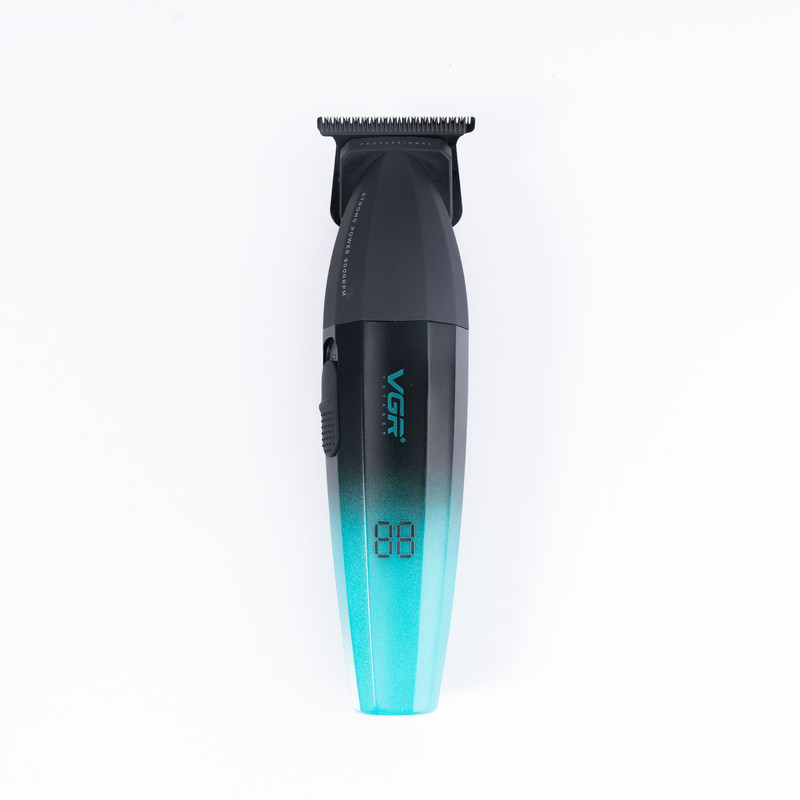 ماشین اصلاح موی سر و صورت وی جی ار مدل V-906، اصلاح به صورت صفر زن، خط زن، منبع انرژی باتری، تکنولوژی اصلاح به صورت تریمر، مدت زمان شارژ 150 دقیقه و مدت زمان استفاده پس از شارژ 240 دقیقه، به همراه کابل شارژ USB، برس تمیزکننده، روغن و محافظ، عملکرد توربو