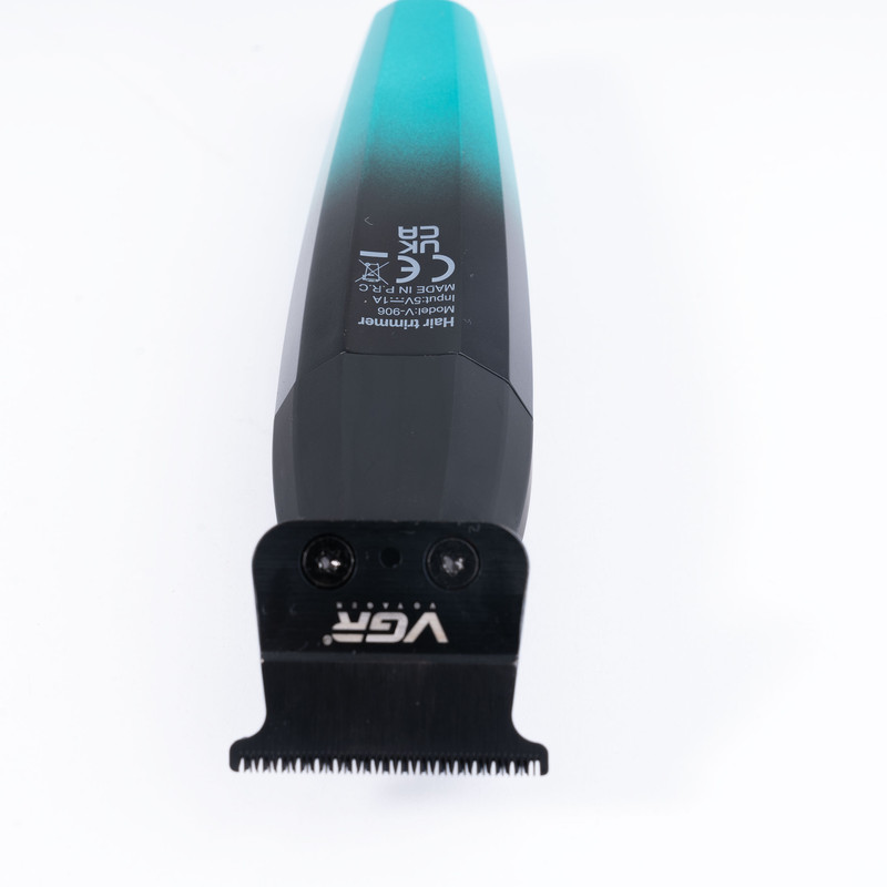 ماشین اصلاح موی سر و صورت وی جی ار مدل V-906، اصلاح به صورت صفر زن، خط زن، منبع انرژی باتری، تکنولوژی اصلاح به صورت تریمر، مدت زمان شارژ 150 دقیقه و مدت زمان استفاده پس از شارژ 240 دقیقه، به همراه کابل شارژ USB، برس تمیزکننده، روغن و محافظ، عملکرد توربو