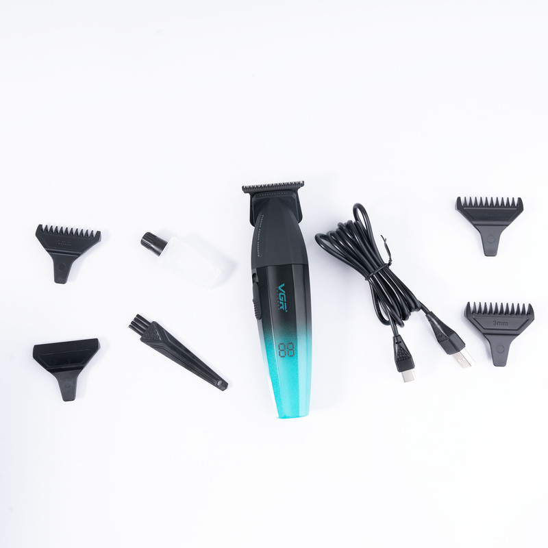 ماشین اصلاح موی سر و صورت وی جی ار مدل V-906، اصلاح به صورت صفر زن، خط زن، منبع انرژی باتری، تکنولوژی اصلاح به صورت تریمر، مدت زمان شارژ 150 دقیقه و مدت زمان استفاده پس از شارژ 240 دقیقه، به همراه کابل شارژ USB، برس تمیزکننده، روغن و محافظ، عملکرد توربو